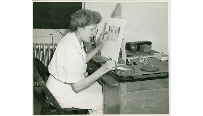 Mildred Burrage working on watercolor